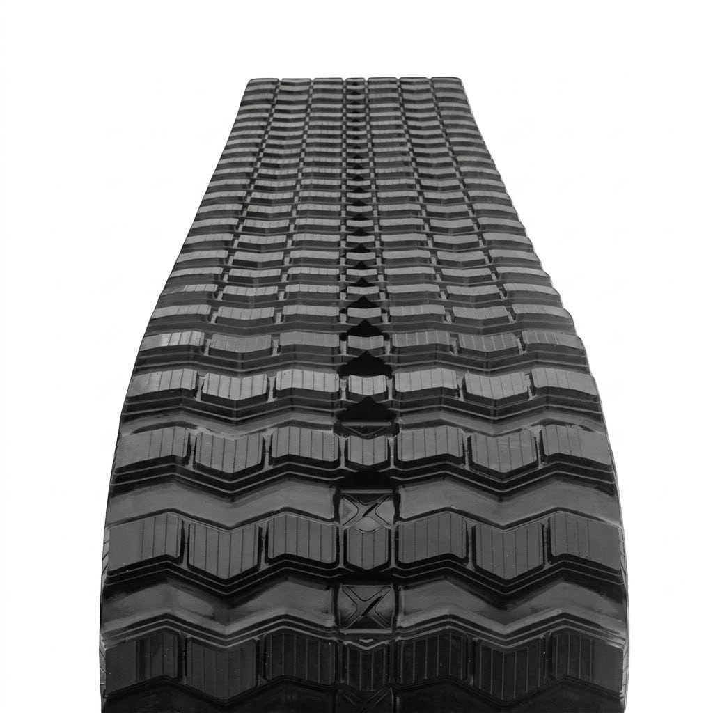 Aggressive mud-clearing Zig-Zag tread on a Caterpillar 259D rubber track.